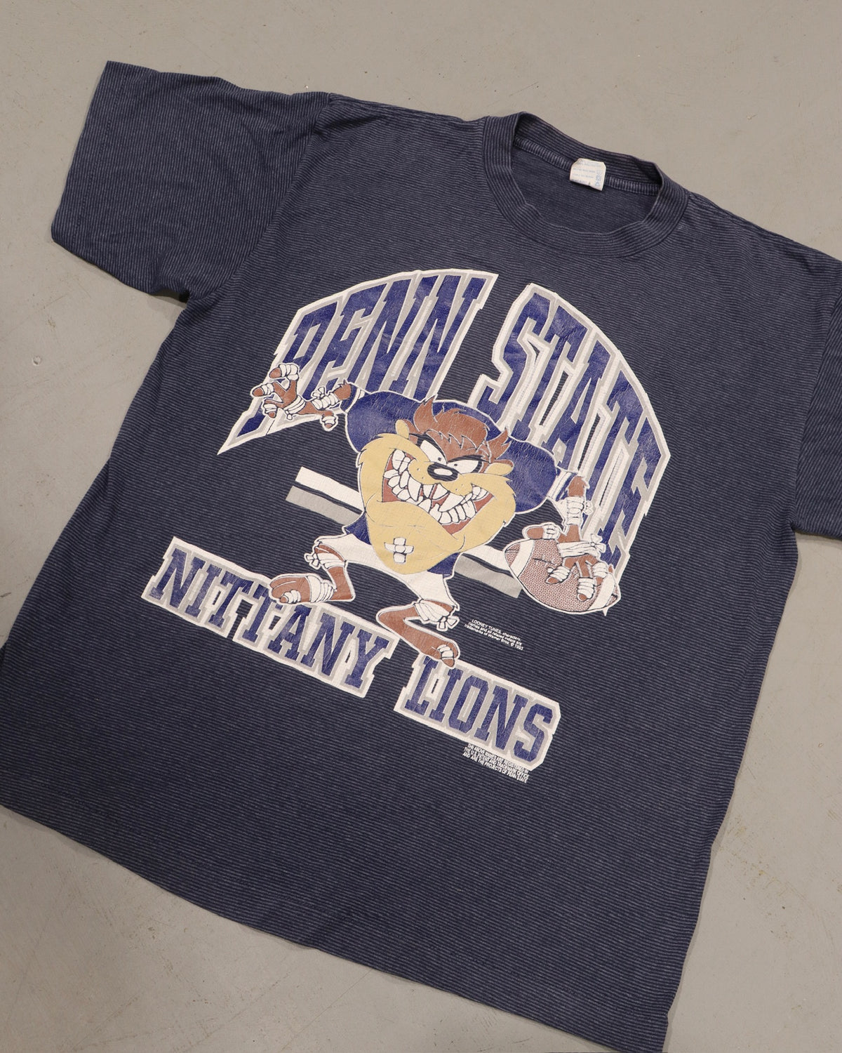 Vintage navy Penn State tee with Nittany Lions mascot graphic and collegiate lettering