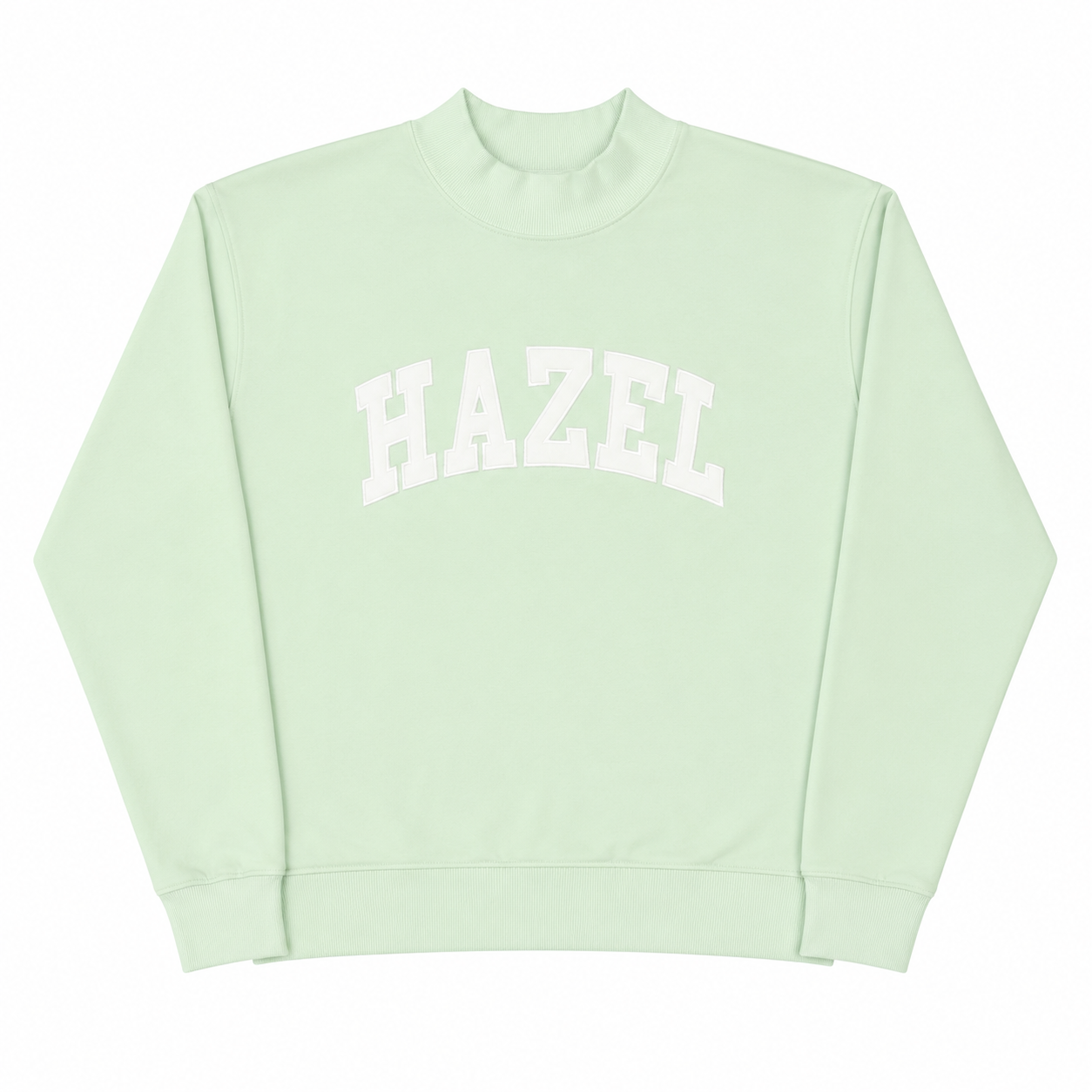 Mint green mockneck sweatshirt with white "HAZEL" lettering across the chest, laid flat.