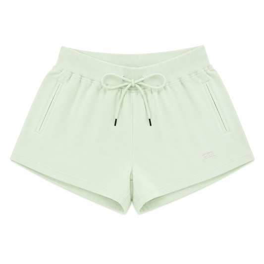 Light mint green casual shorts with drawstring waist and side pockets, perfect for relaxed summer days.