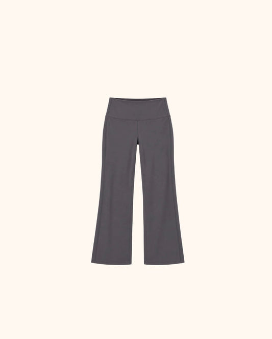 Slate grey high waisted bell bottom pants displayed against a light background