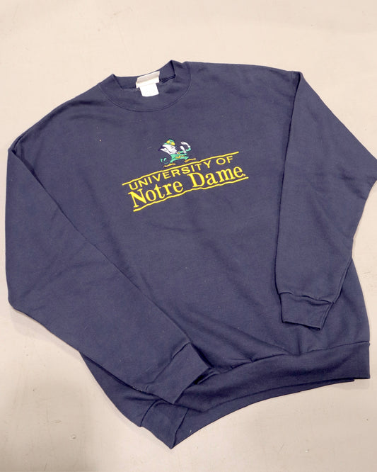 Navy Notre Dame crewneck sweatshirt with vintage University of Notre Dame graphic and long sleeves
