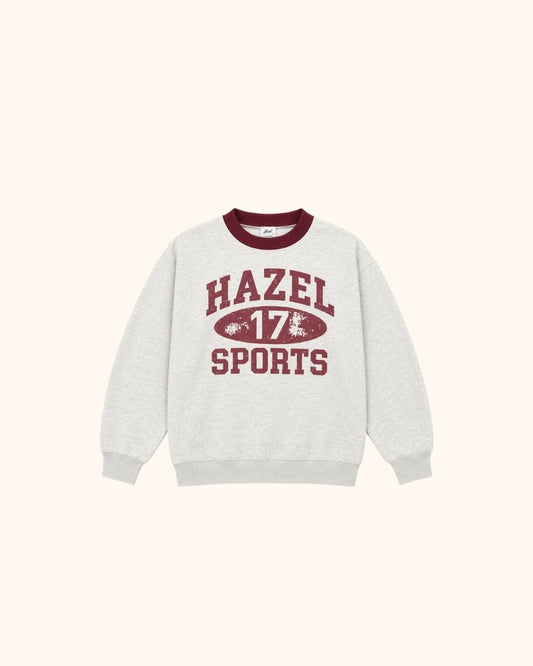 Light gray sports sweatshirt with burgundy trim and HAZEL 17 SPORTS graphic on front
