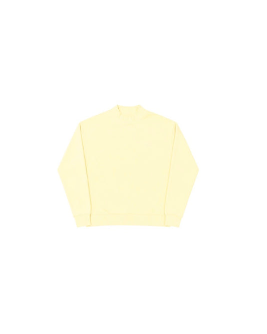 Light yellow mockneck sweater with long sleeves and a relaxed fit, simple and casual style.