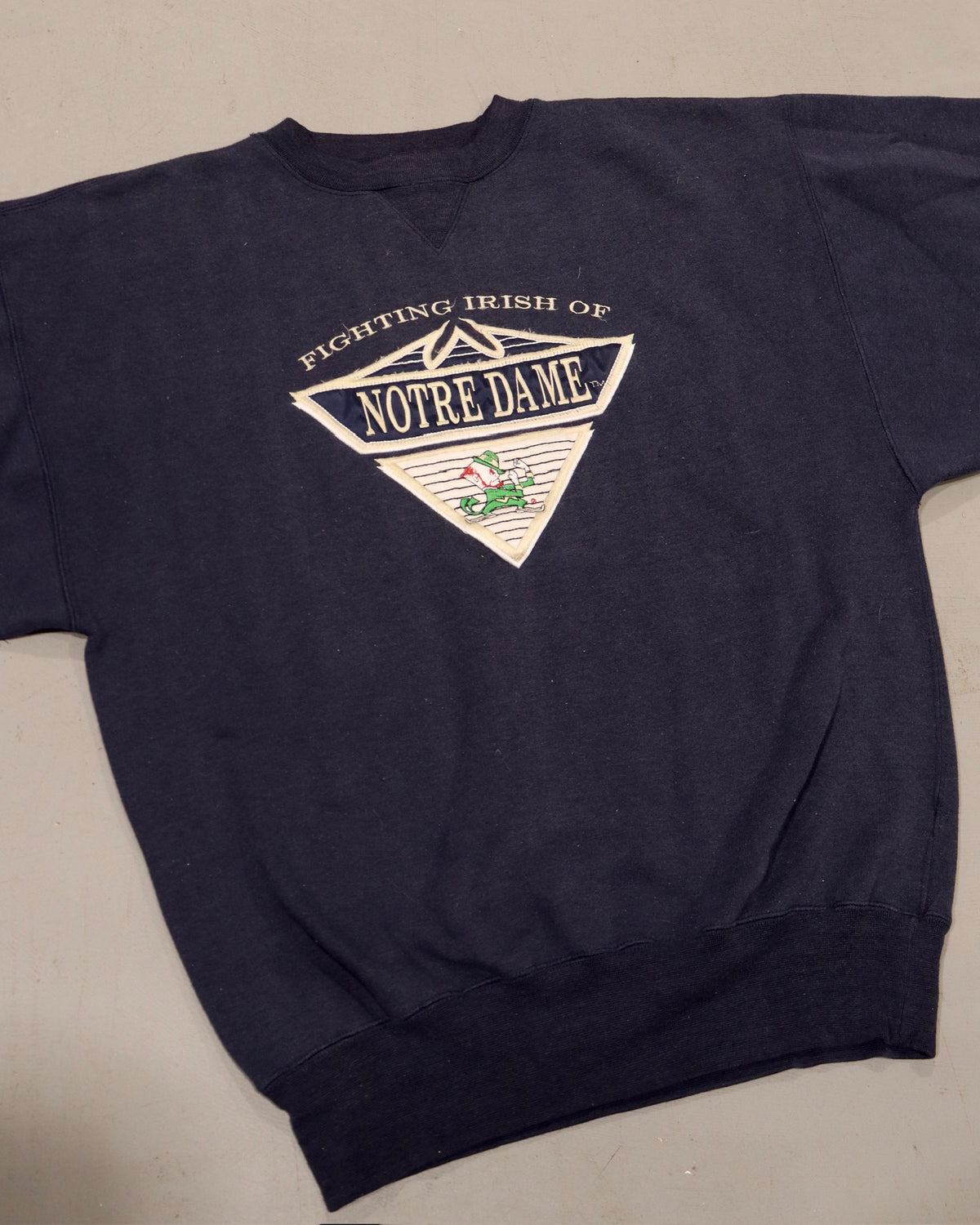 Vintage navy Notre Dame crewneck sweatshirt with Fighting Irish triangle graphic