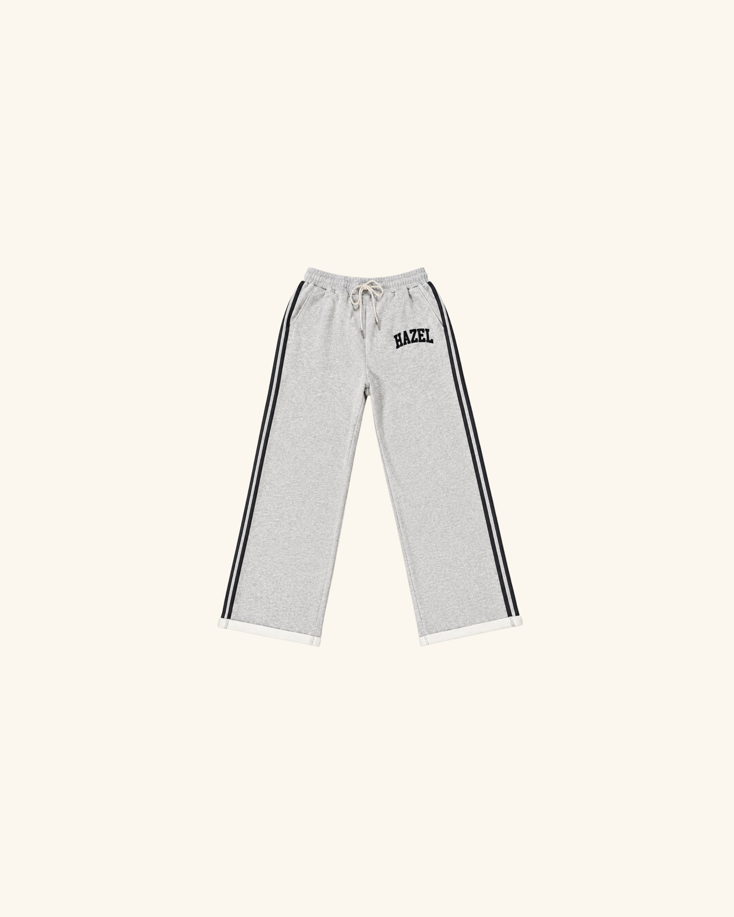 Gray sweatpants with black side stripes drawstring waist and small Hazel logo