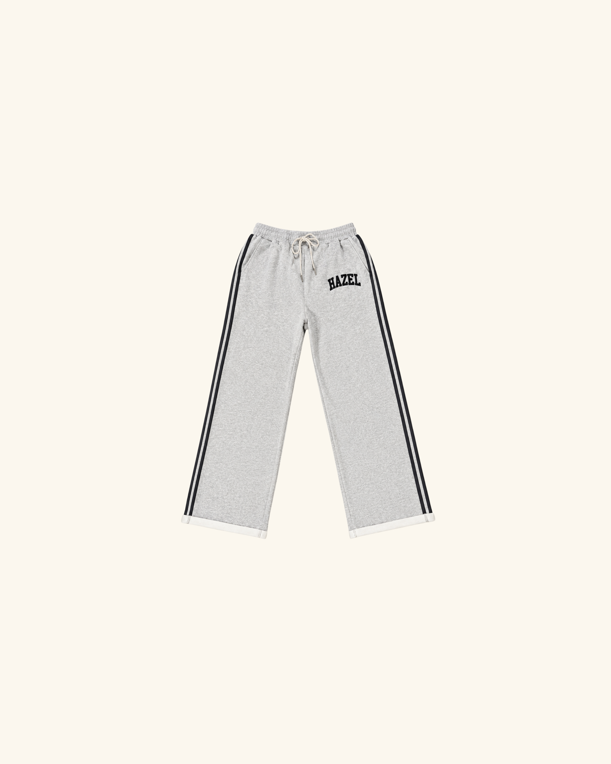 Gray sweatpants with black side stripes drawstring waist and small Hazel logo