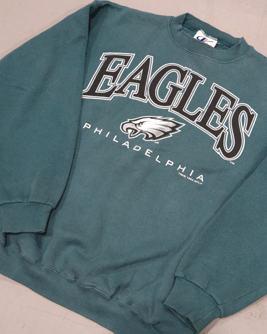 Green vintage Eagles Philadelphia crewneck sweatshirt with collegiate graphic and ribbed trim