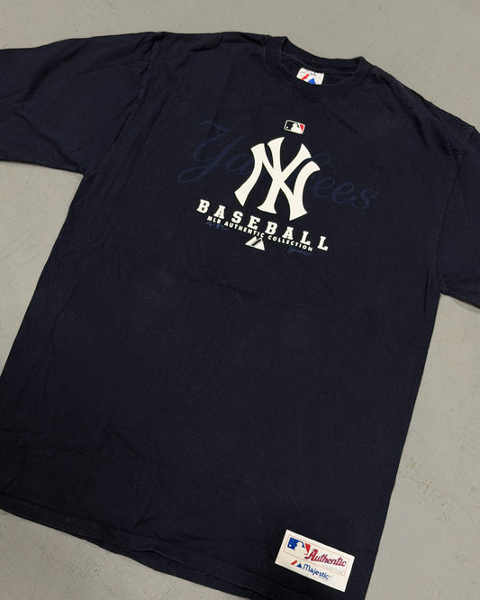 Navy vintage Yankees baseball tee with NY logo and classic hem label