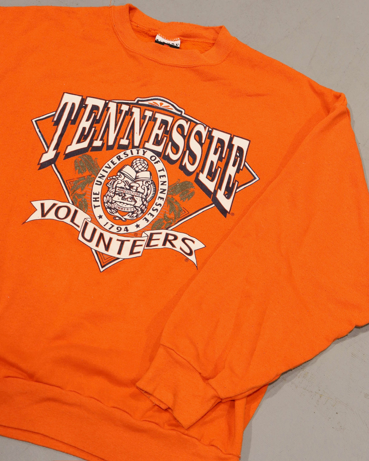 Vintage orange Tennessee Volunteers crewneck sweatshirt with University of Tennessee graphic