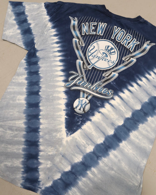 Blue and white tie dye tee with a vintage New York Yankees graphic and baseball emblem
