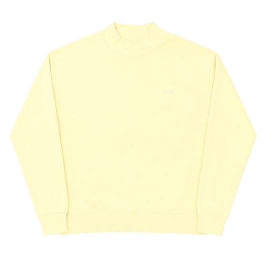 Light yellow mockneck sweatshirt with long sleeves and ribbed cuffs, minimal casual style
