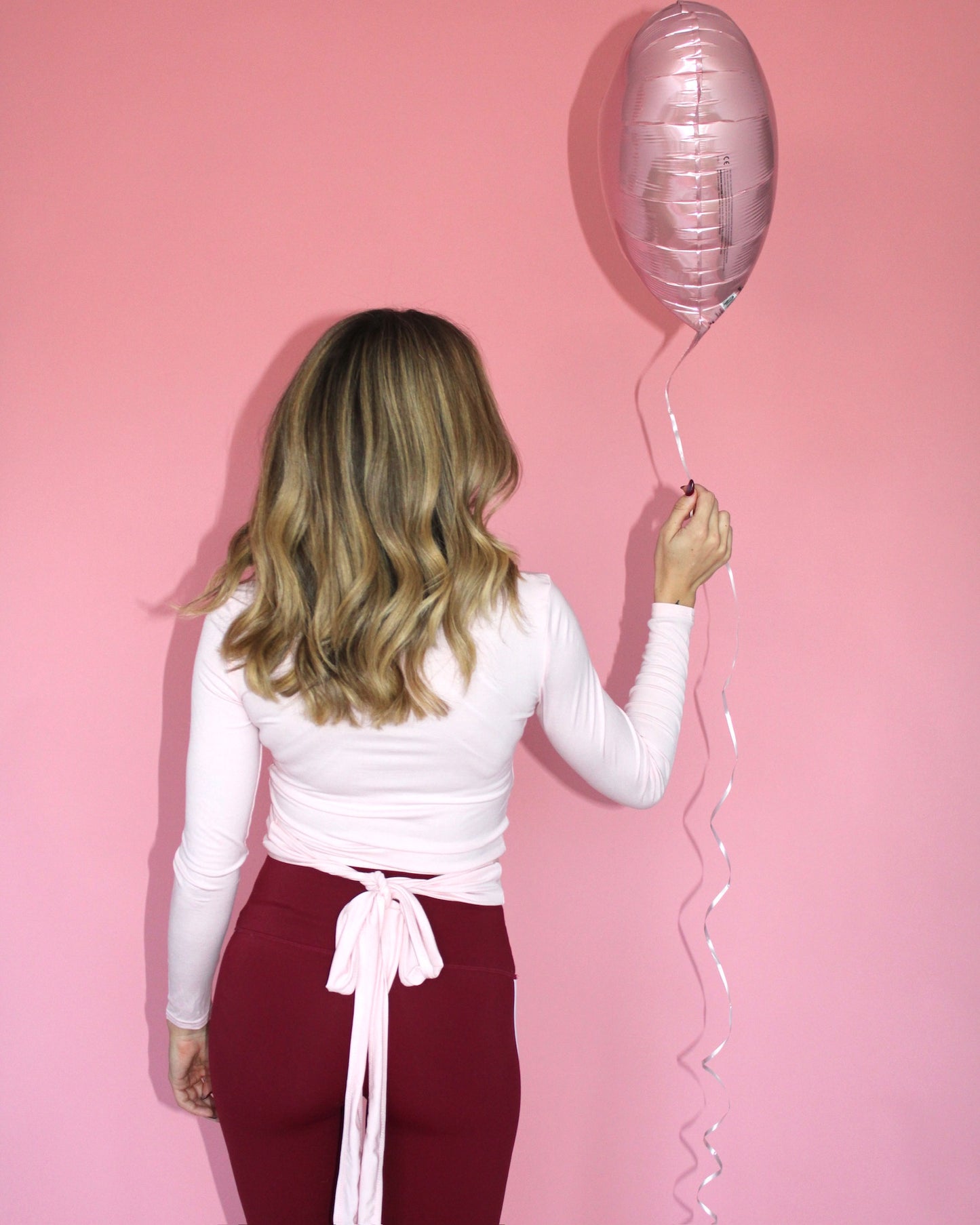 The Knock Out Wrap Top