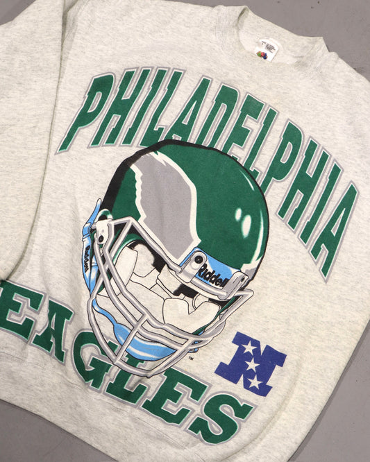 Vintage gray Philadelphia Eagles tee with green lettering and football helmet graphic