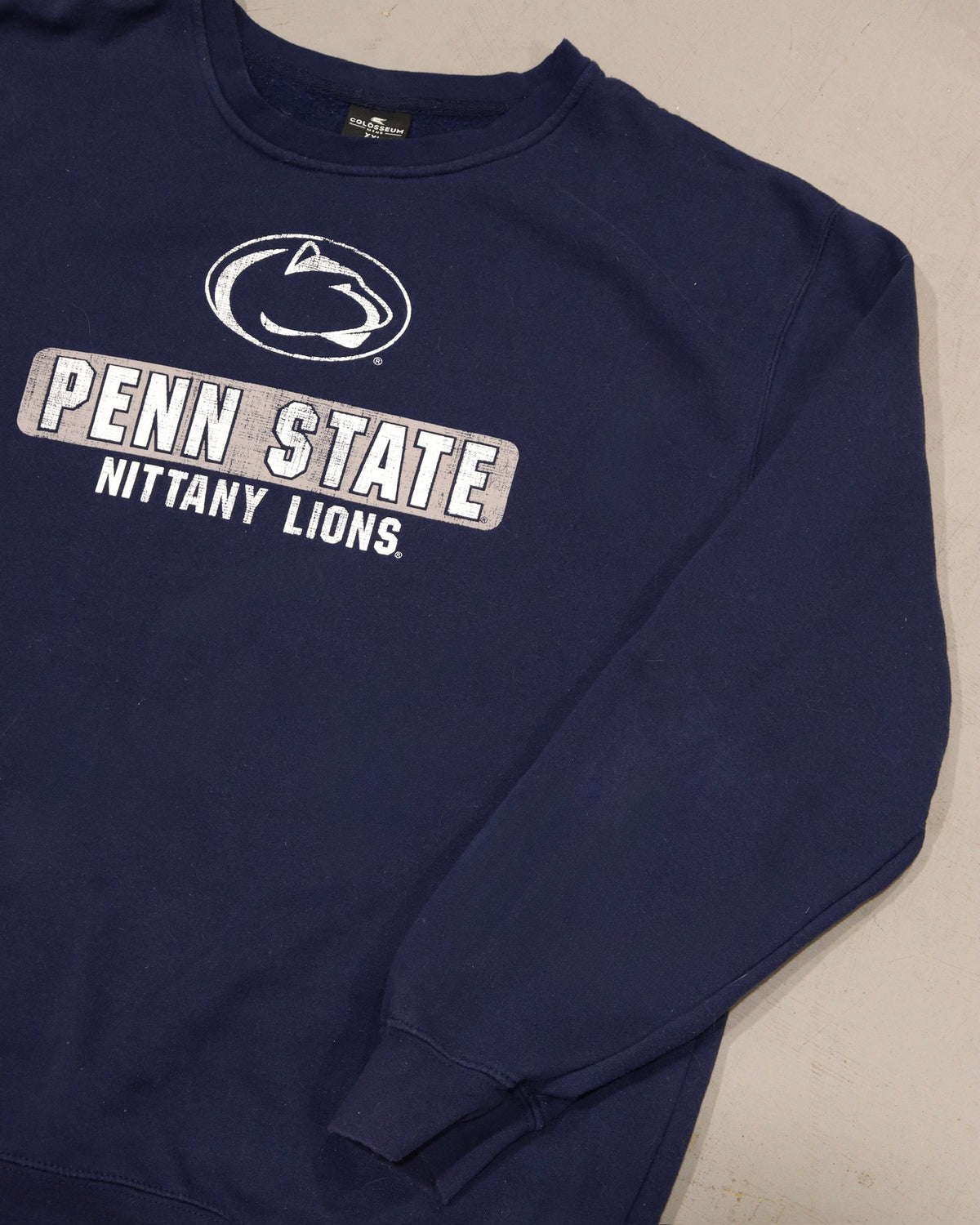 Vintage navy Penn State crewneck sweatshirt with Nittany Lions graphic and long sleeves
