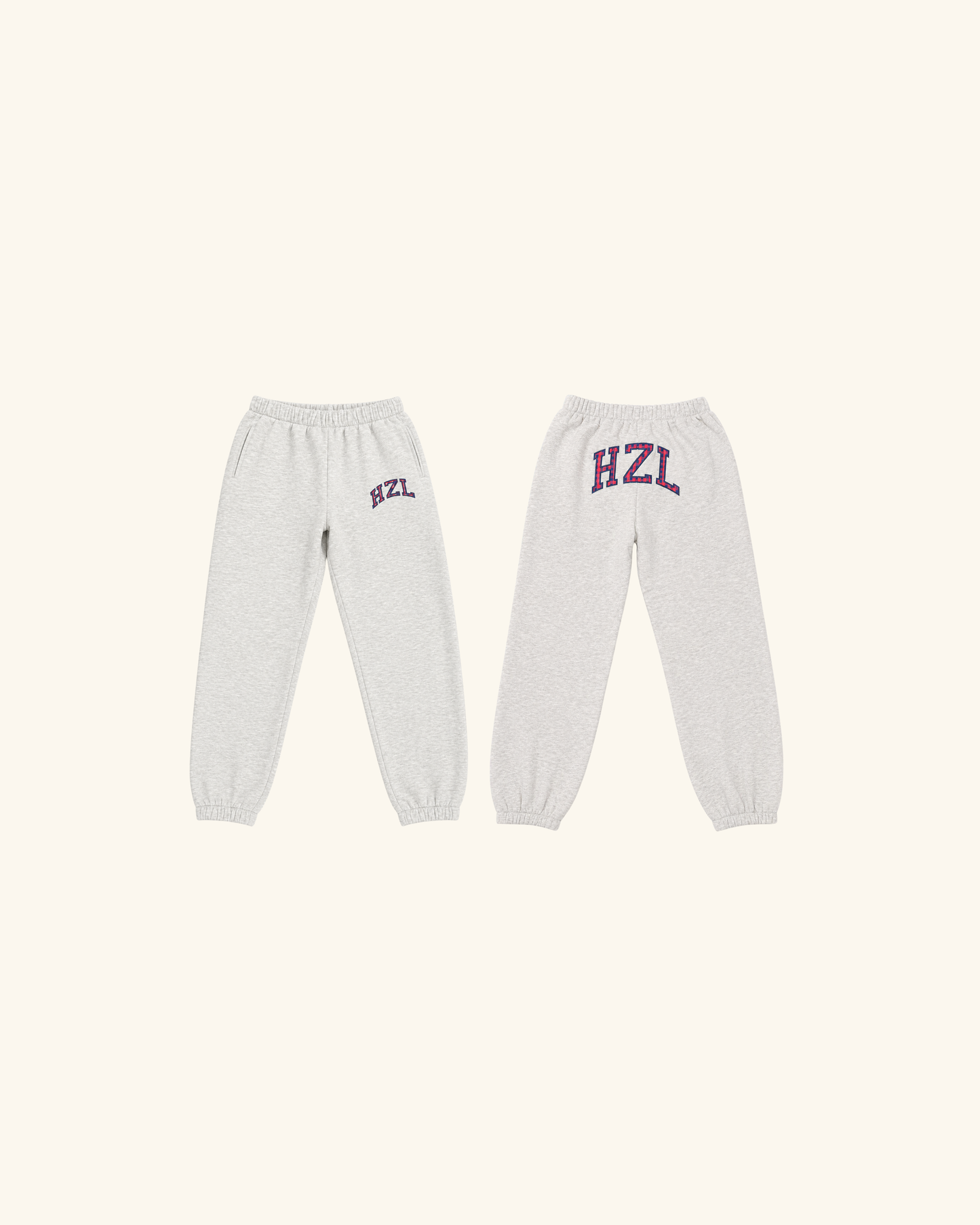 Light gray joggers shown from the front and back with HZL lettering