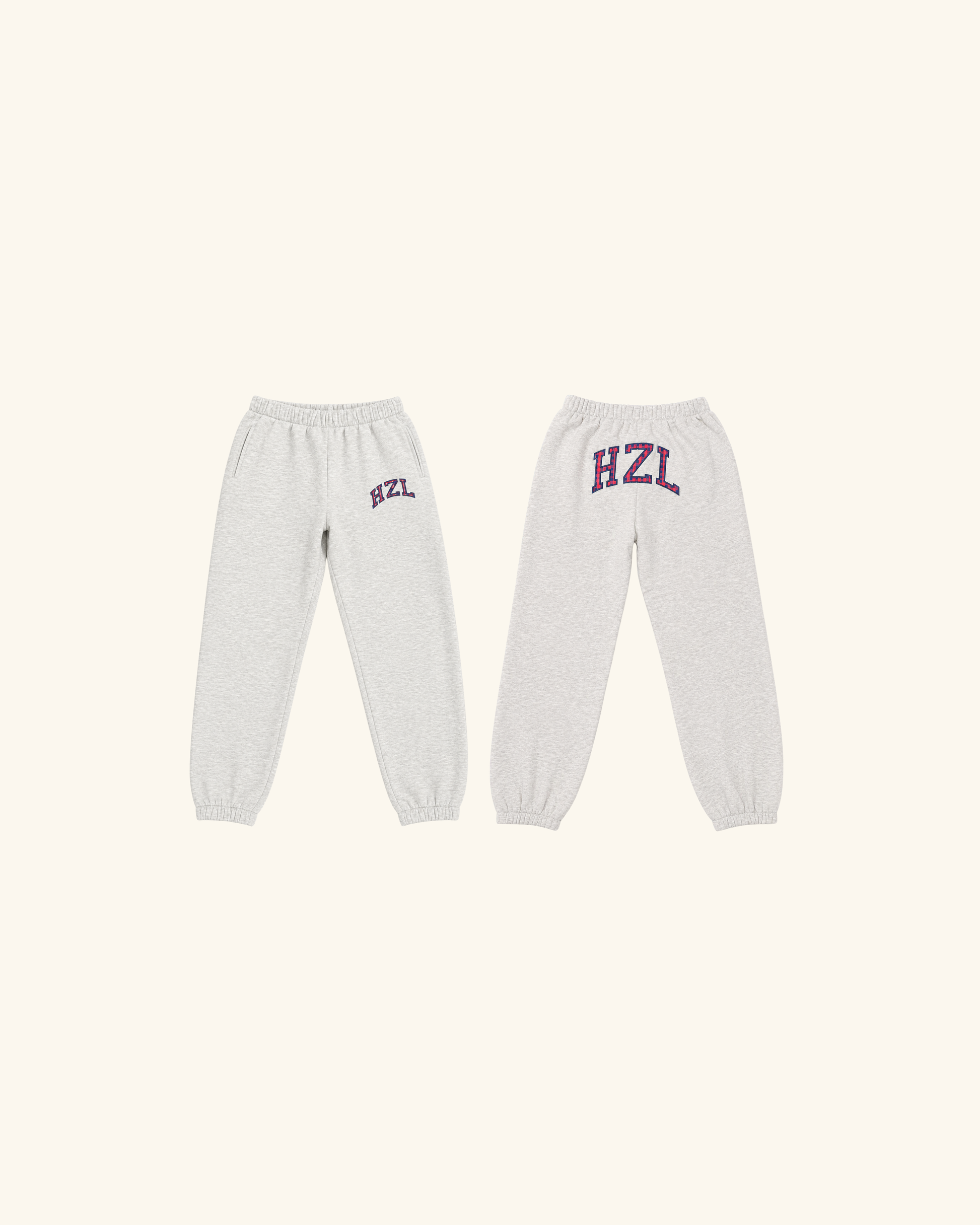 Light gray joggers shown from the front and back with HZL lettering