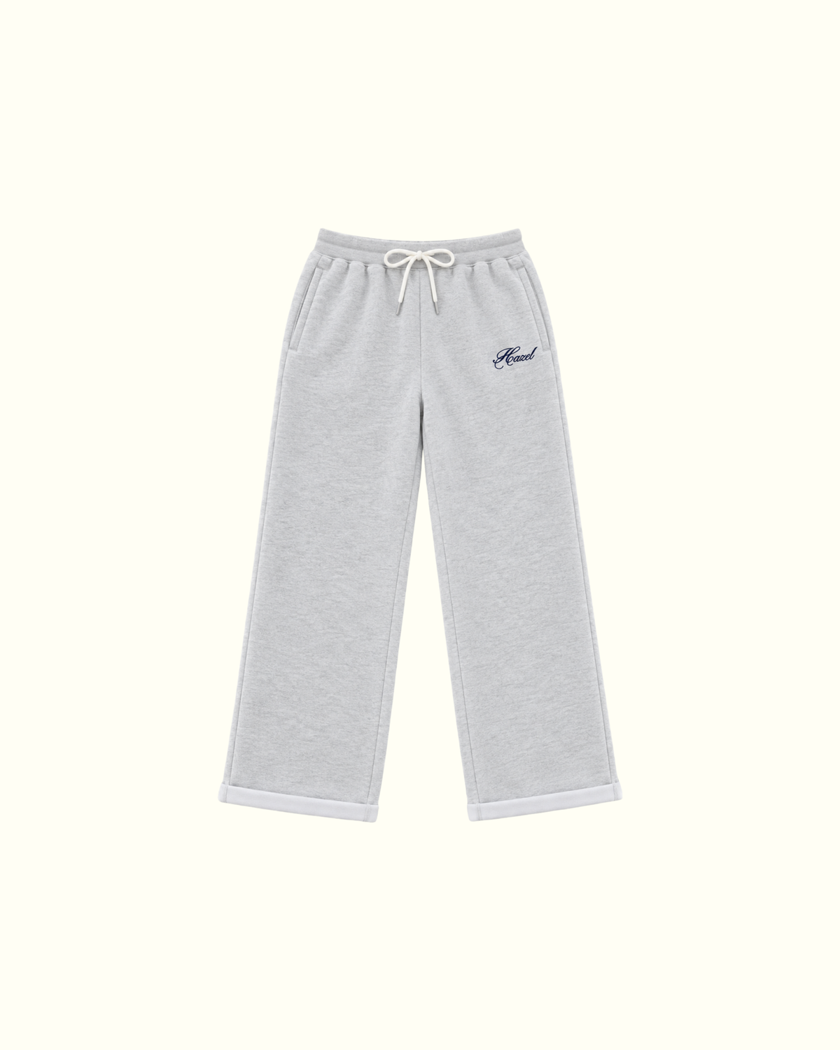 Light gray sweatpants with a drawstring waist, straight legs, cuffed hems, and a small embroidered logo